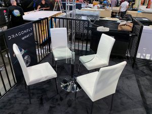 white lance chairs with talia cafe table - V-Decor Trade Show Furniture Rentals in Las Vegas